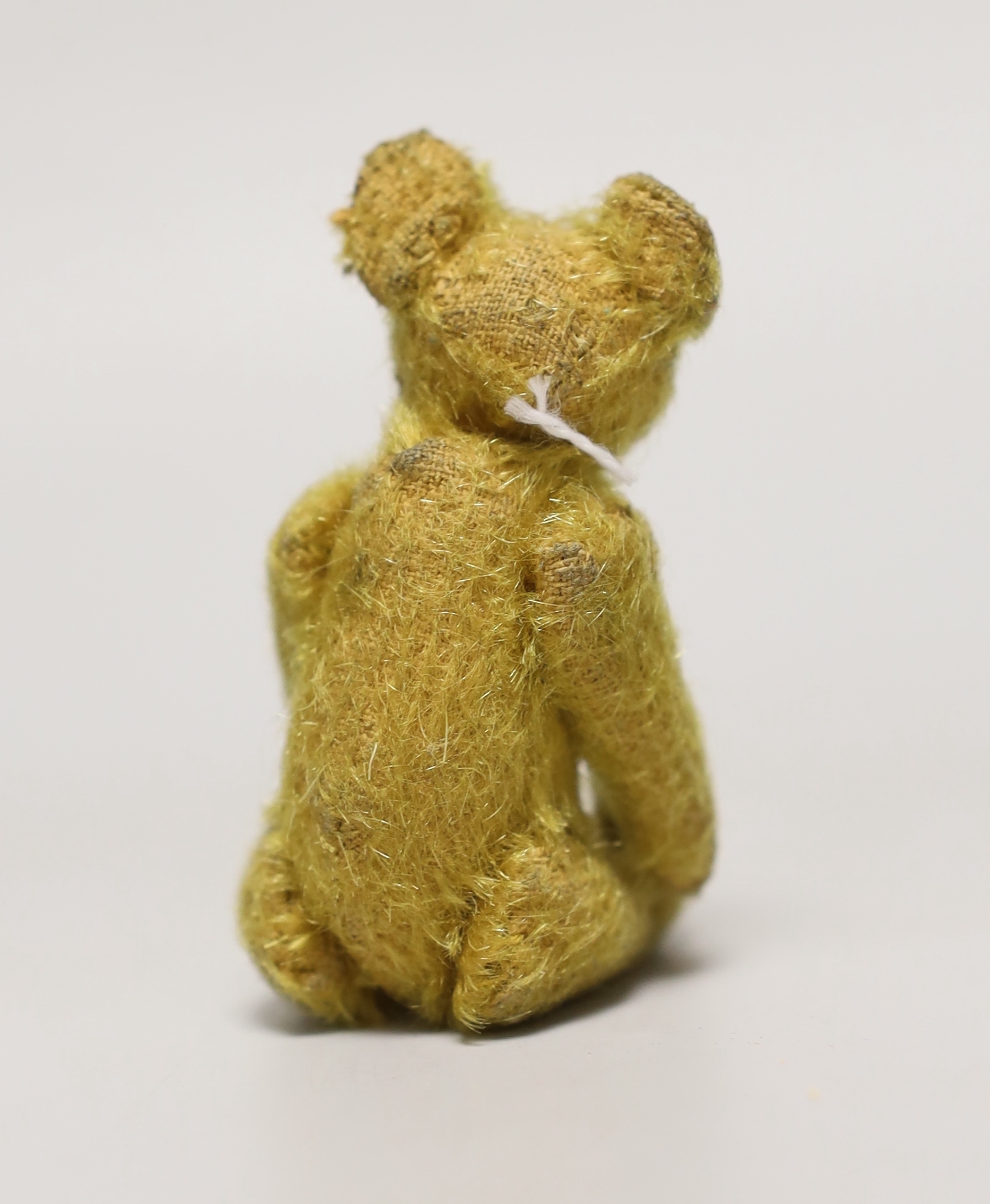 A Steiff Mini bear, c.1915, no button, 4in.